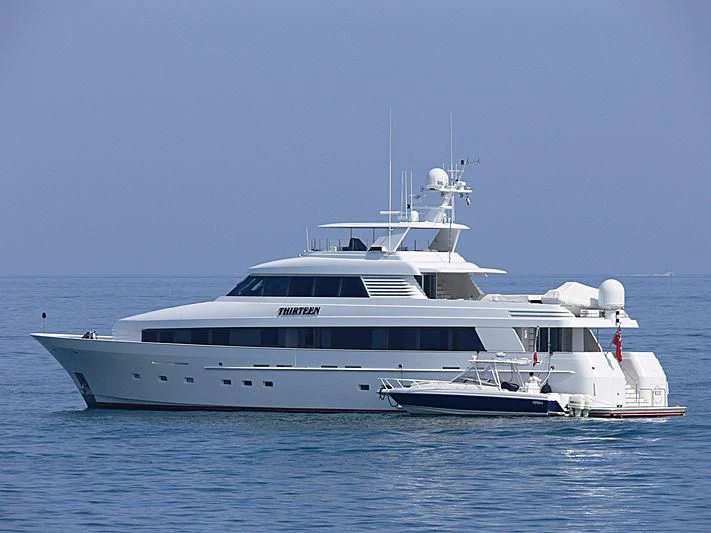 a white yacht in the water aboard SIDRA Yacht for Sale