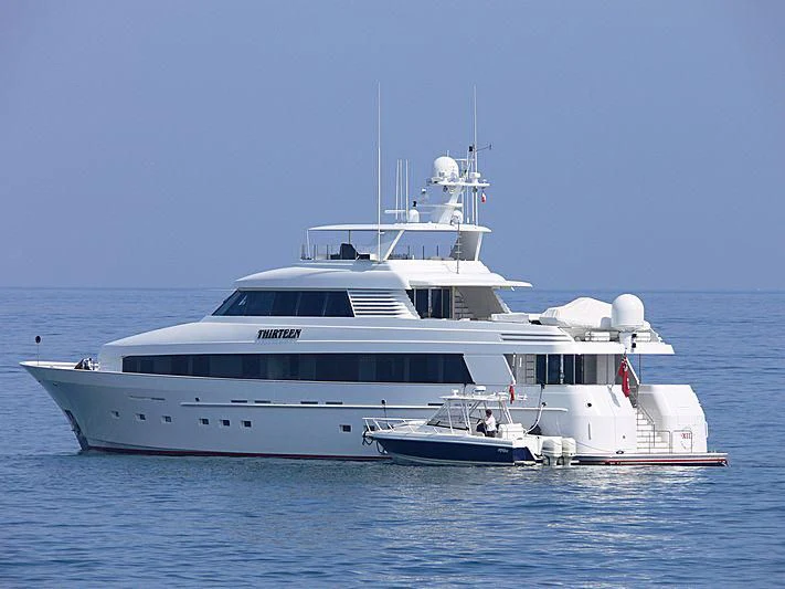 a white yacht in the water aboard SIDRA Yacht for Sale
