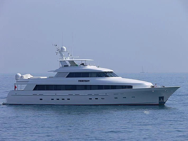 a large white boat in the water aboard SIDRA Yacht for Sale