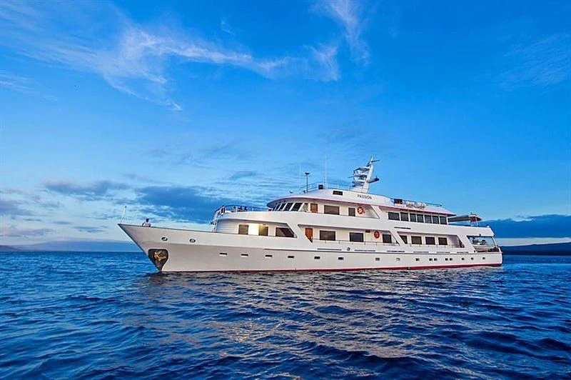 a white yacht in the water aboard PASSION Yacht for Sale