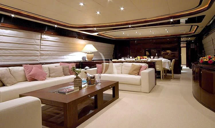 a living room with a couch and a table aboard TWO KAY Yacht for Sale