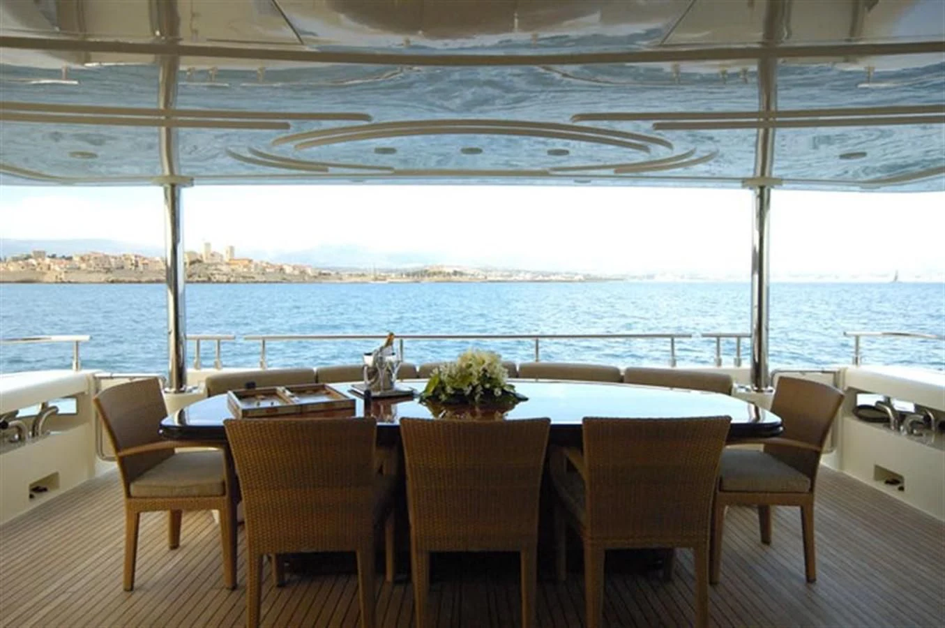 a table and chairs on a deck aboard TWO KAY Yacht for Sale