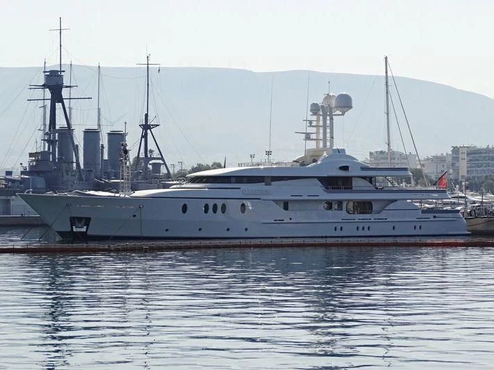 a large white boat in the water aboard LIGHTNING Yacht for Sale