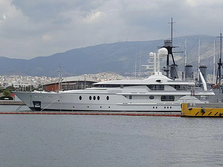 a large white boat in the water aboard LIGHTNING Yacht for Sale