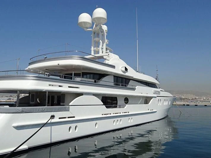a white yacht in the water aboard LIGHTNING Yacht for Sale