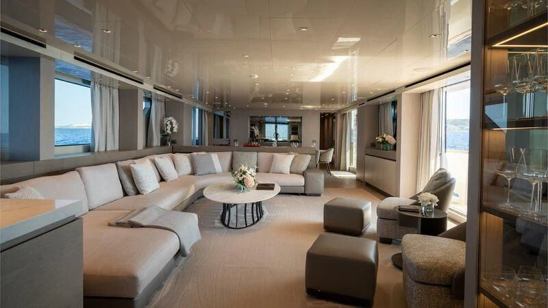 a living room with a couch and a coffee table aboard LANCE Yacht for Sale