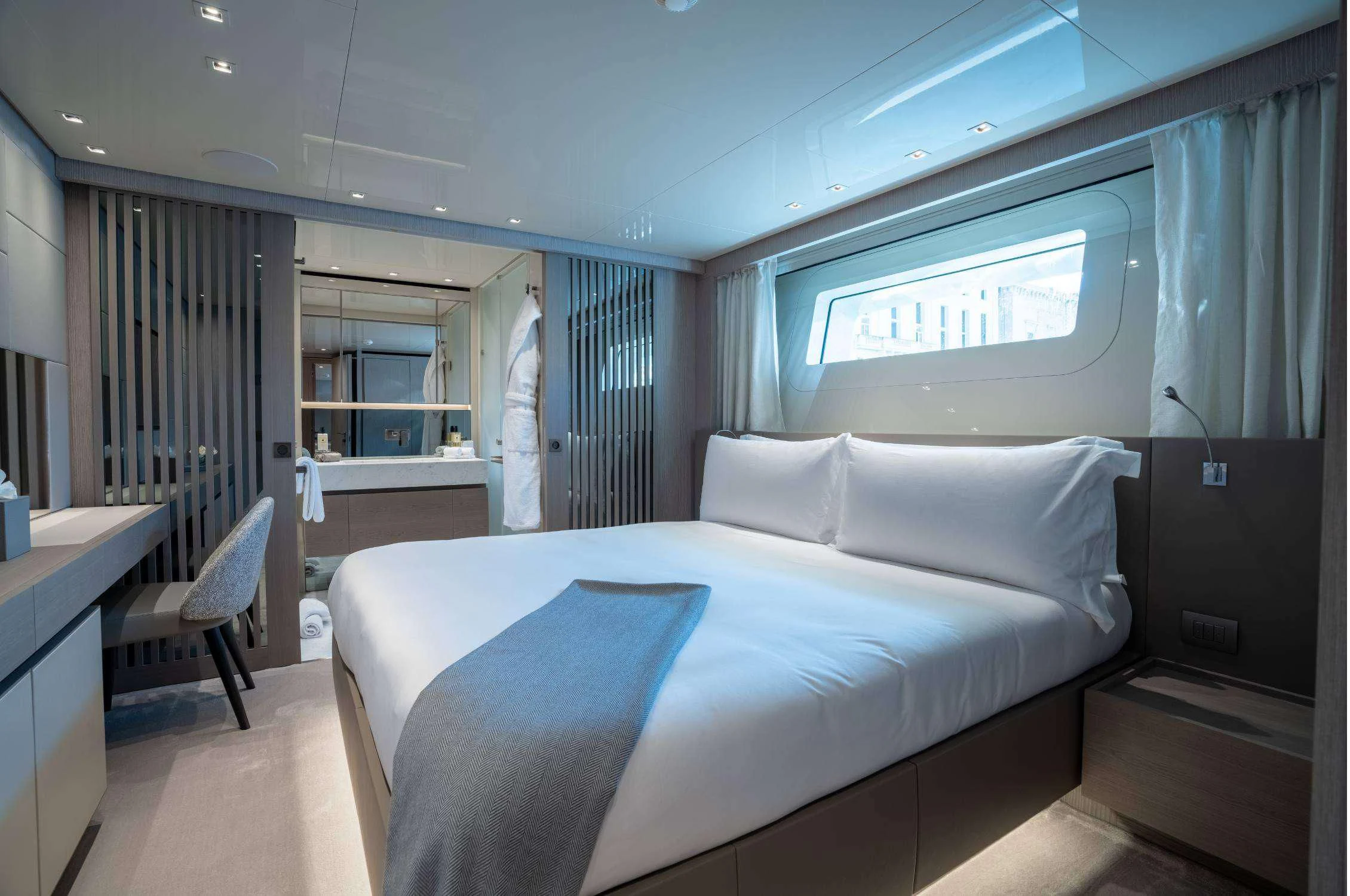 a bed in a room aboard LANCE Yacht for Sale