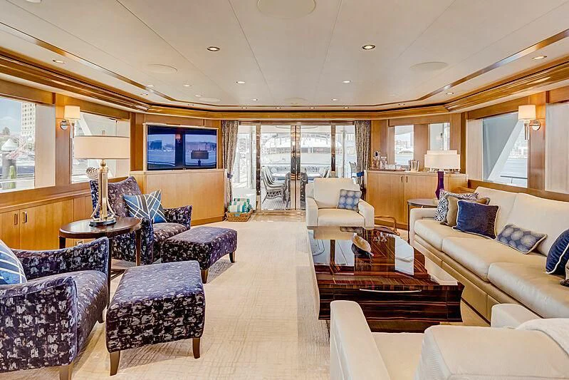 a living room with a large window aboard JESTSTREAM Yacht for Sale