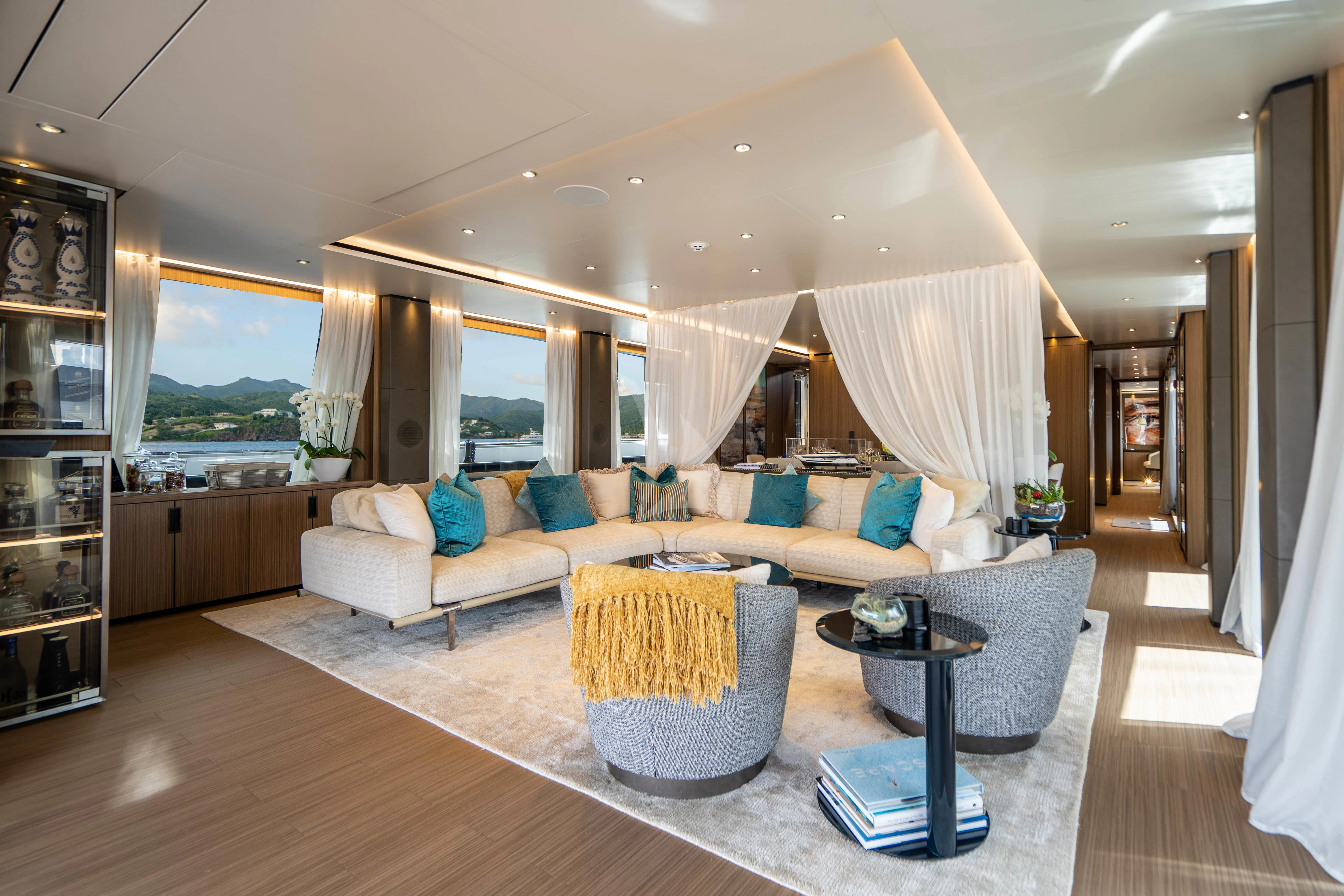 a living room with a large window aboard NEVER BLUE Yacht for Sale