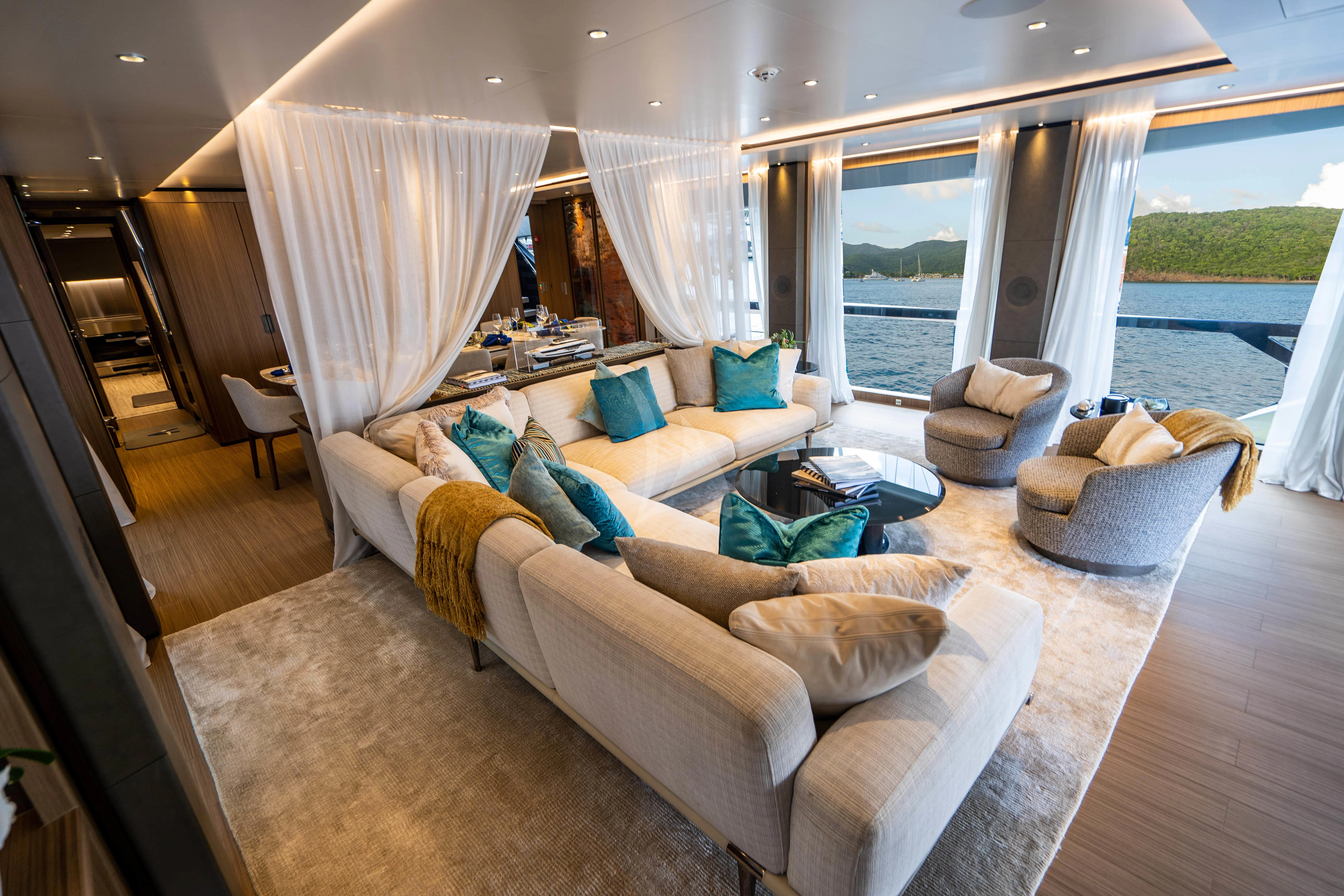 a living room with a large window aboard NEVER BLUE Yacht for Sale