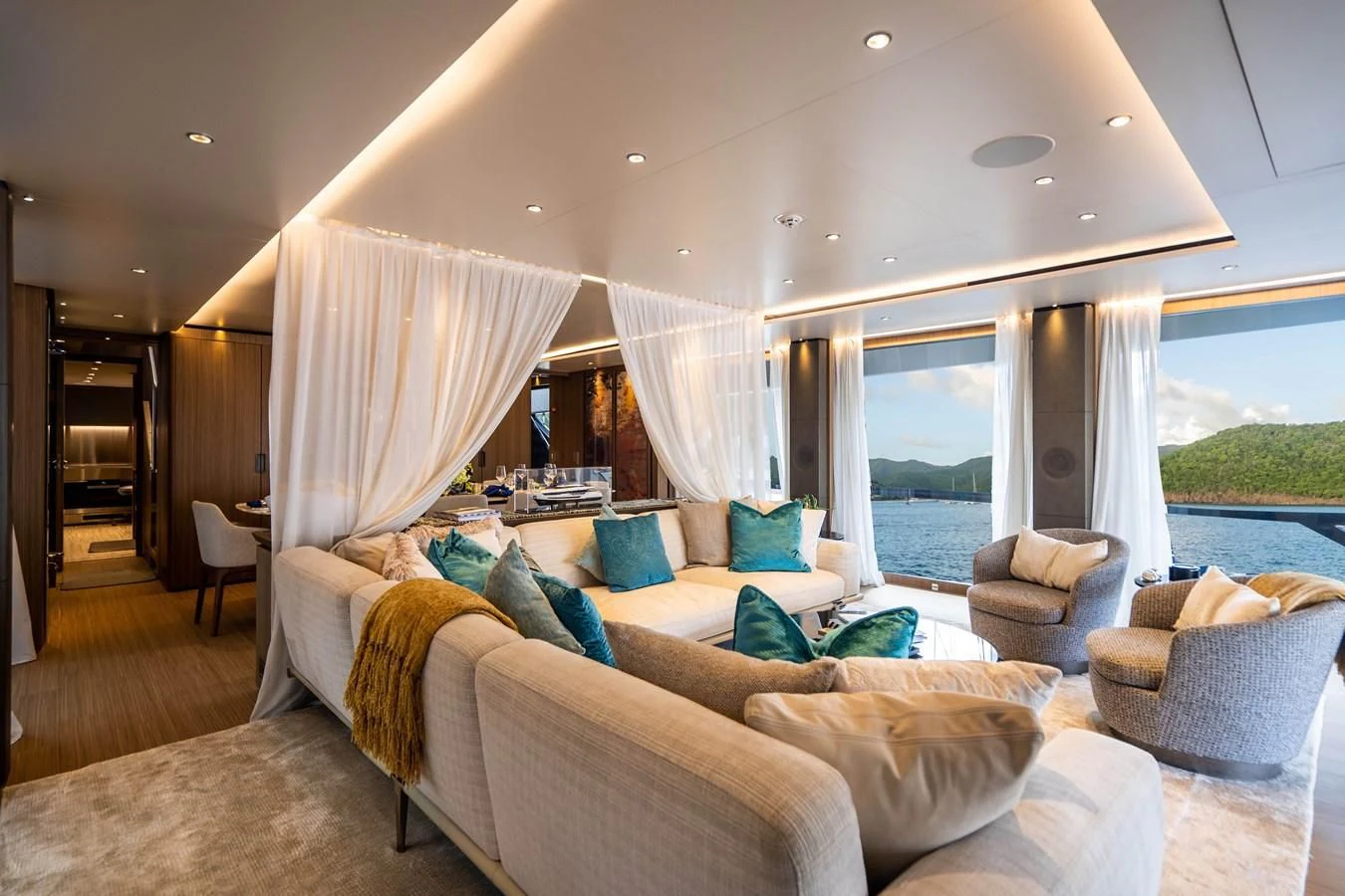 a living room with a large window aboard NEVER BLUE Yacht for Sale