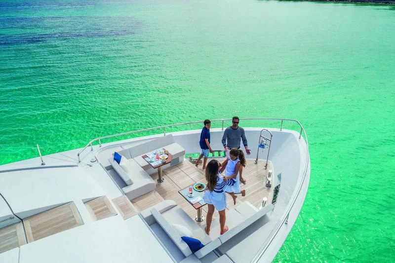a group of people on a boat aboard NEVER BLUE Yacht for Sale