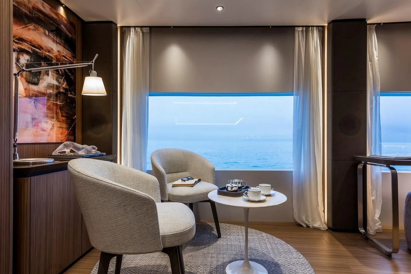 a living room with a large window aboard NEVER BLUE Yacht for Sale