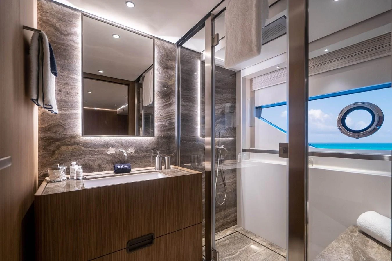 a bathroom with a large mirror aboard NEVER BLUE Yacht for Sale