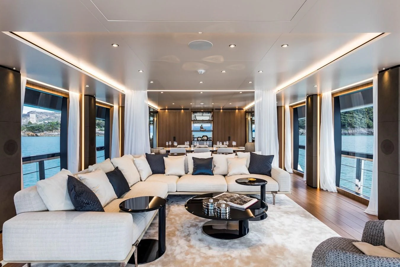 a living room with a large window aboard NEVER BLUE Yacht for Sale
