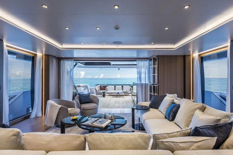 a living room with a large window aboard NEVER BLUE Yacht for Sale