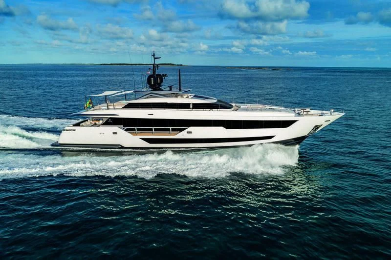 a white boat in the water aboard NEVER BLUE Yacht for Sale