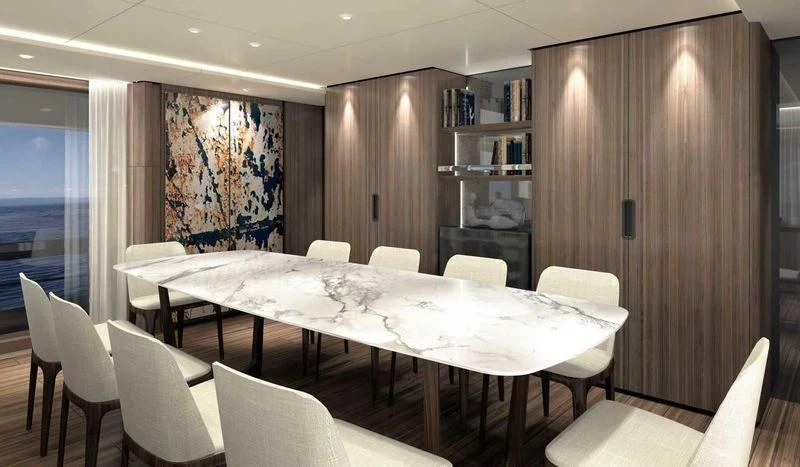 a room with tables and chairs aboard NEVER BLUE Yacht for Sale