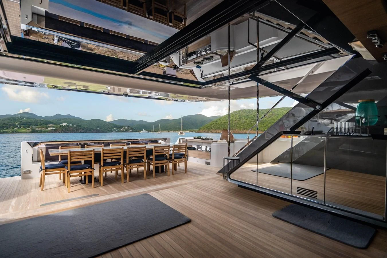 a room with a table and chairs aboard NEVER BLUE Yacht for Sale