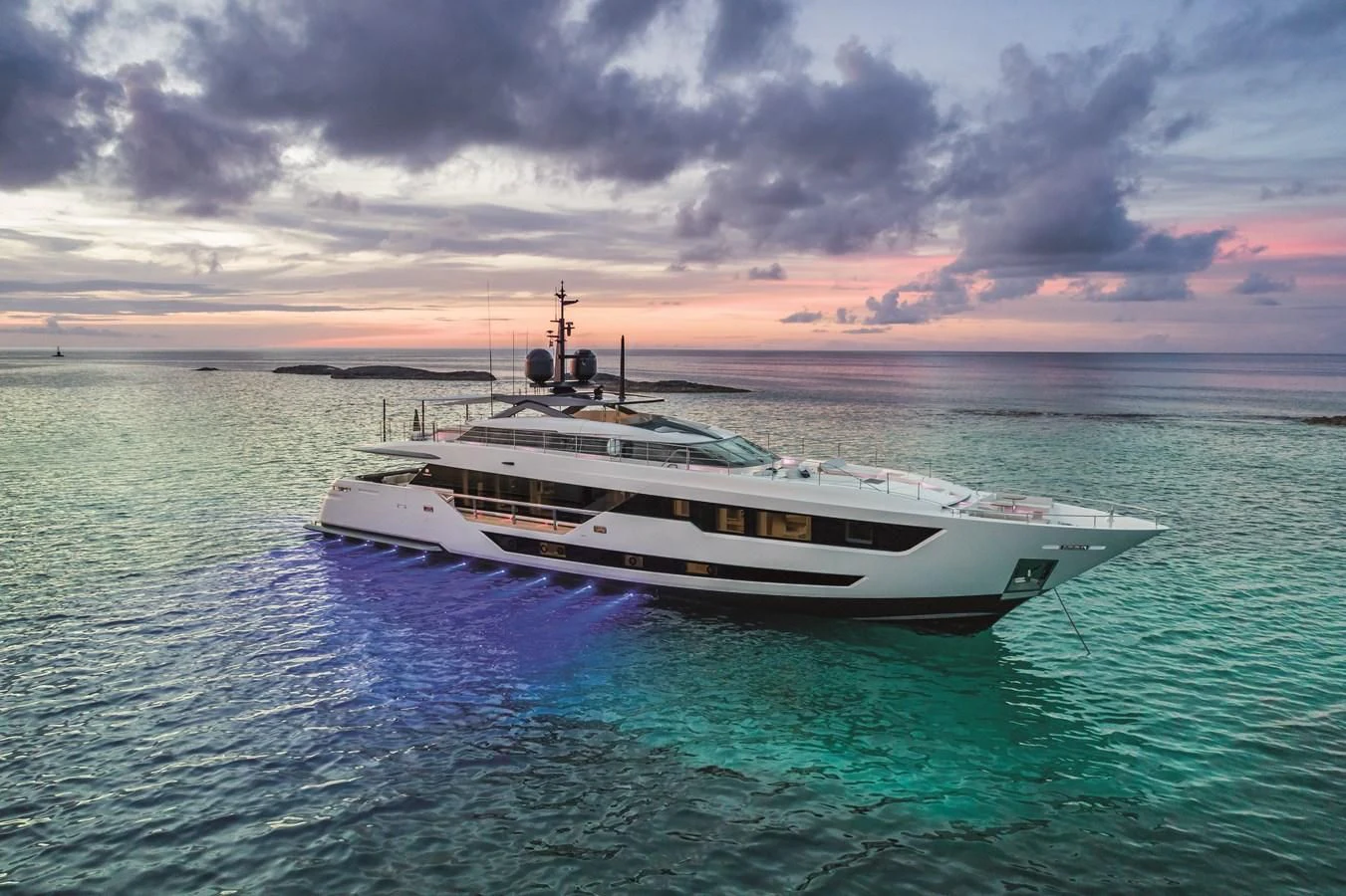 a white boat in the water aboard NEVER BLUE Yacht for Sale