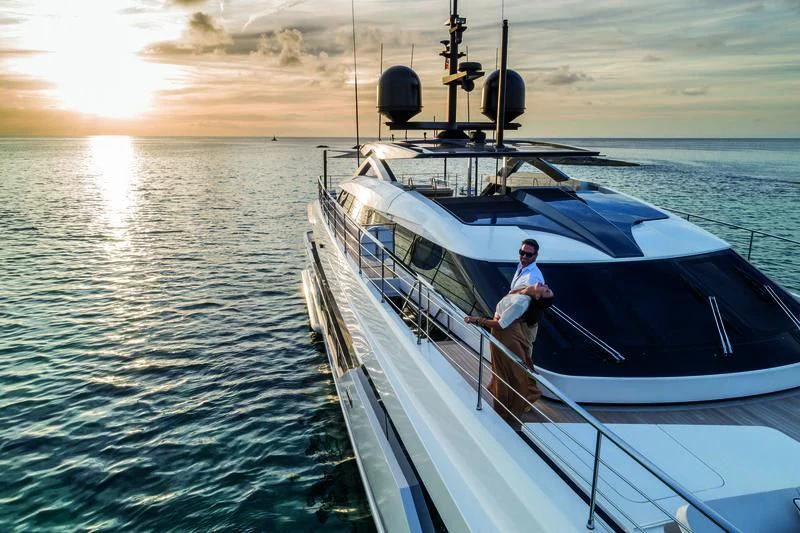 a person standing on a boat aboard NEVER BLUE Yacht for Sale