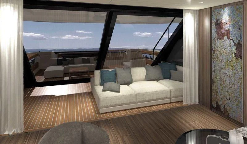 a room with a couch and a large window aboard NEVER BLUE Yacht for Sale