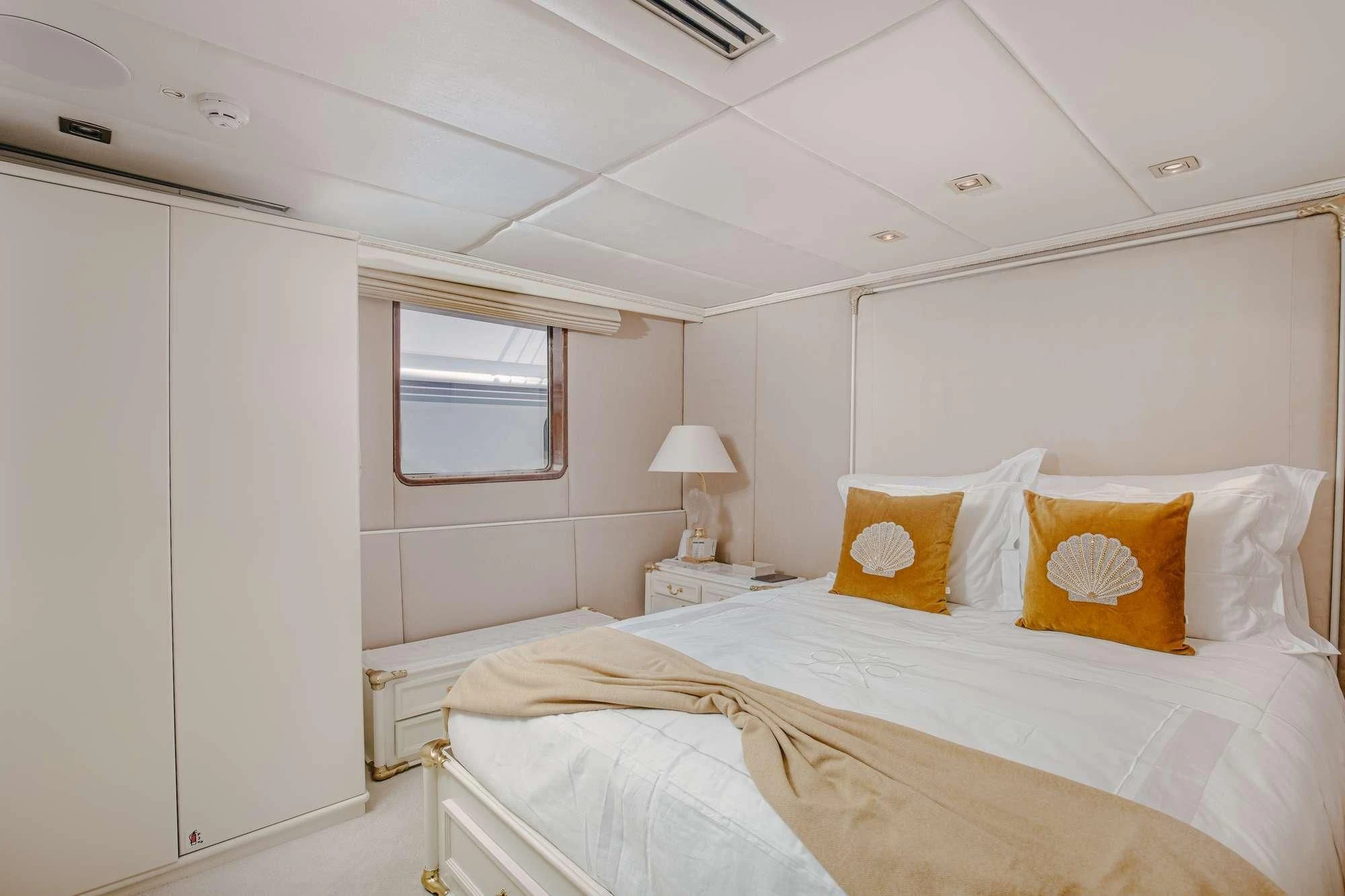 a room with two beds aboard ITOTO Yacht for Charter
