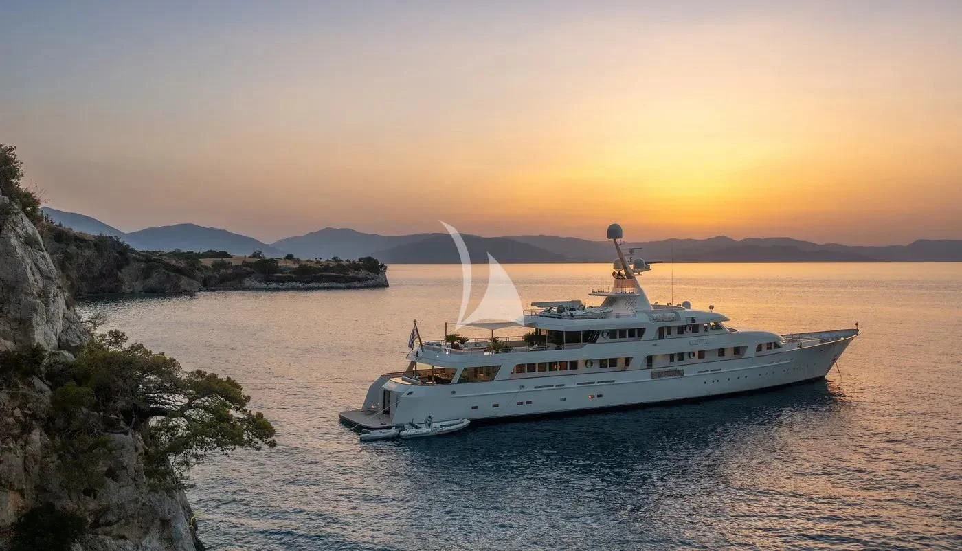 a white yacht in the water aboard ITOTO Yacht for Charter