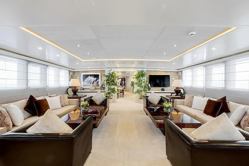a living room with a couch and a table aboard ITOTO Yacht for Charter