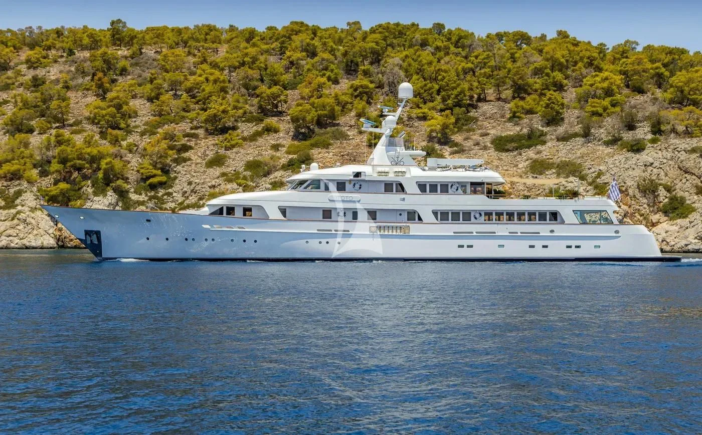 a white yacht in the water aboard ITOTO Yacht for Charter