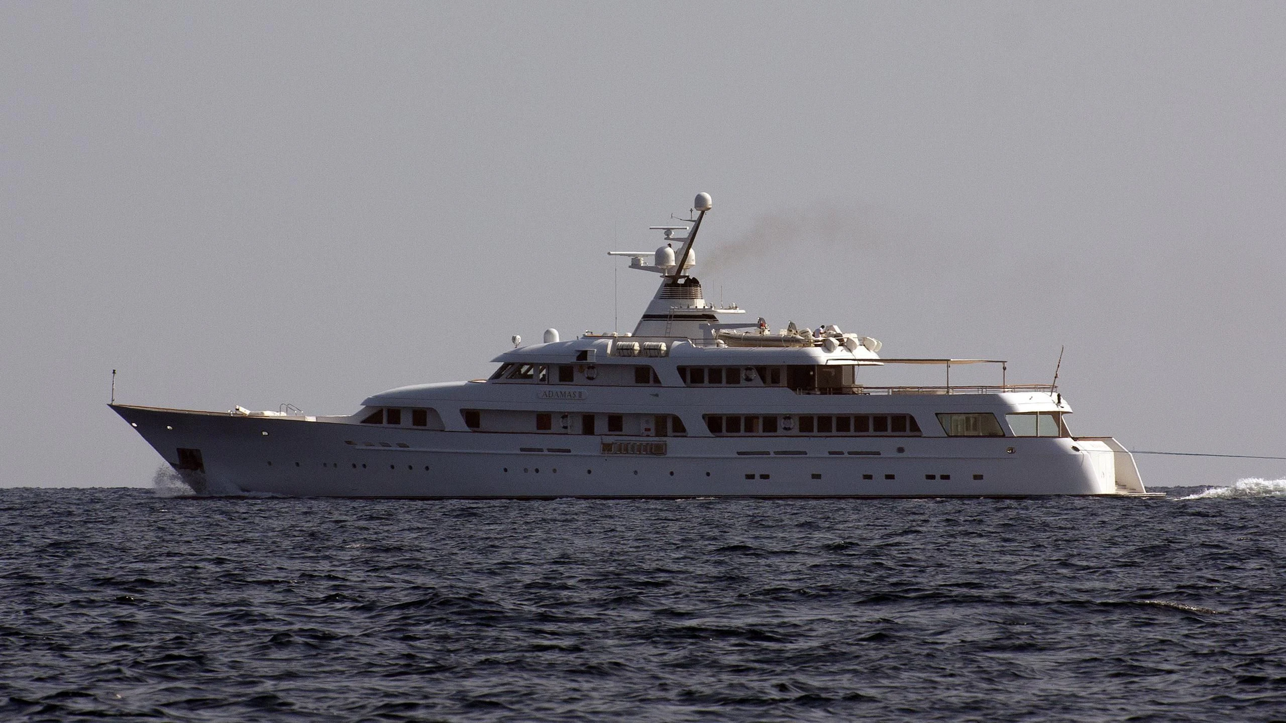 a large white ship in the water aboard ITOTO Yacht for Charter