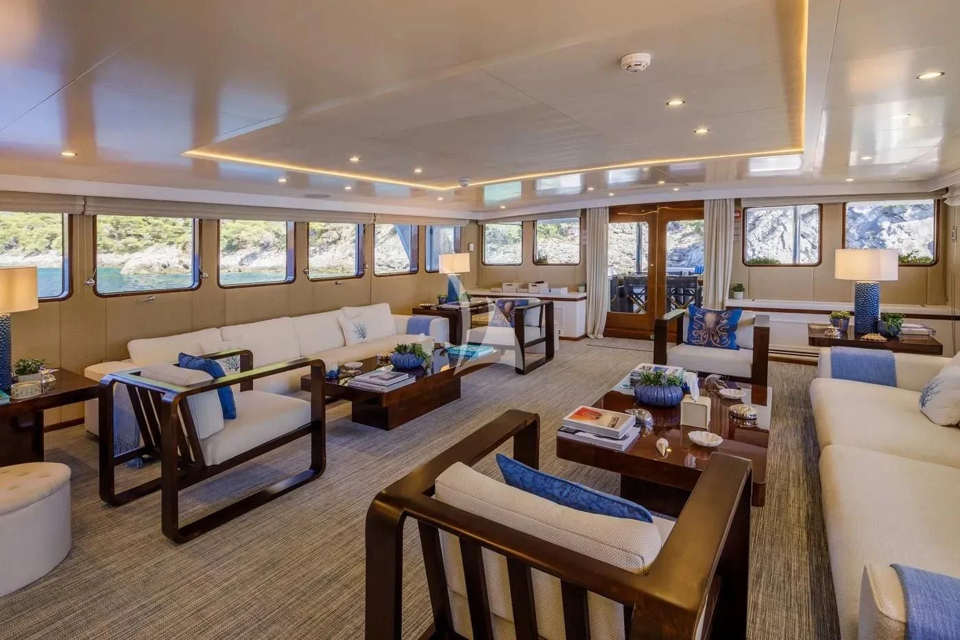 a living room with a couch and a table aboard ITOTO Yacht for Charter
