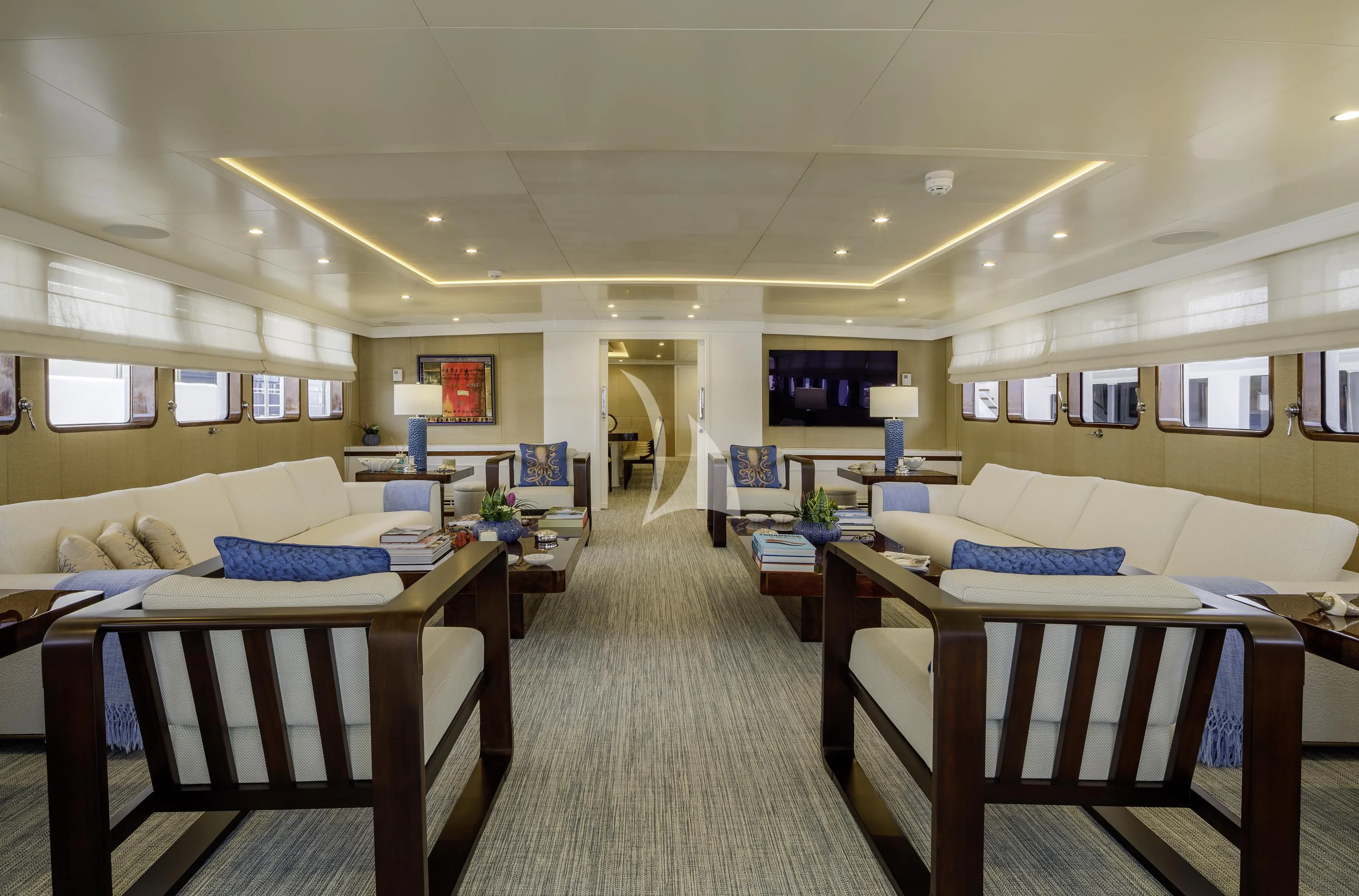 a large room with a bed and a couch aboard ITOTO Yacht for Charter