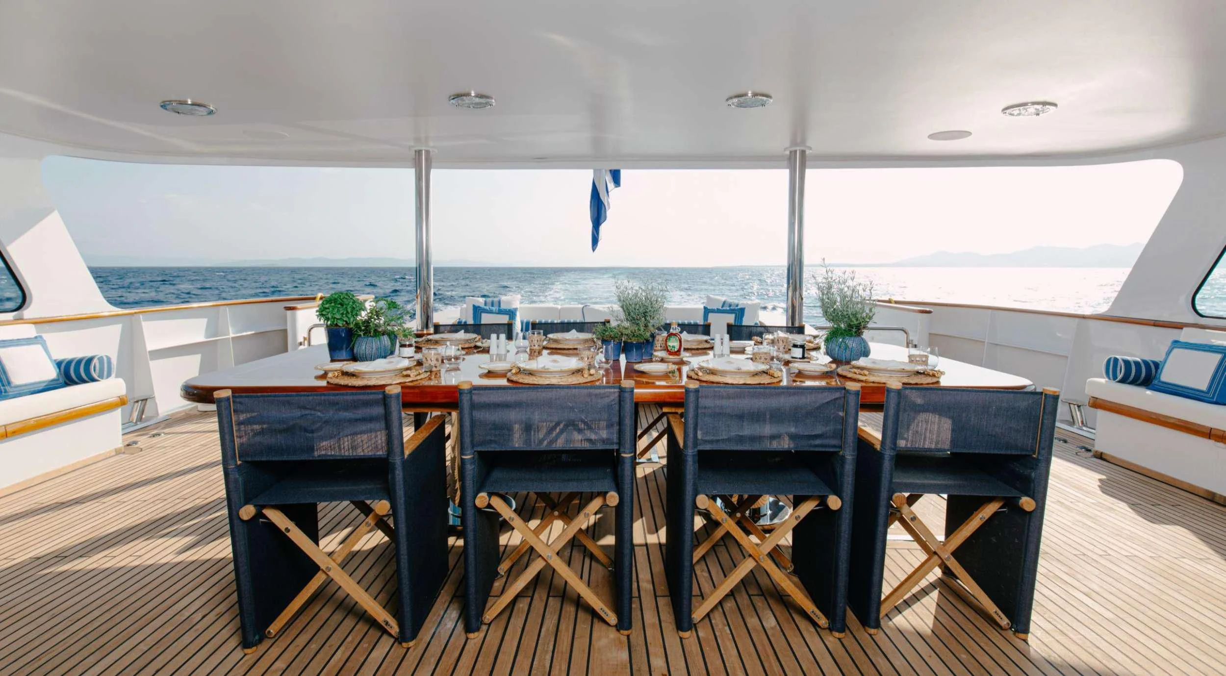 a table set for a meal aboard ITOTO Yacht for Charter