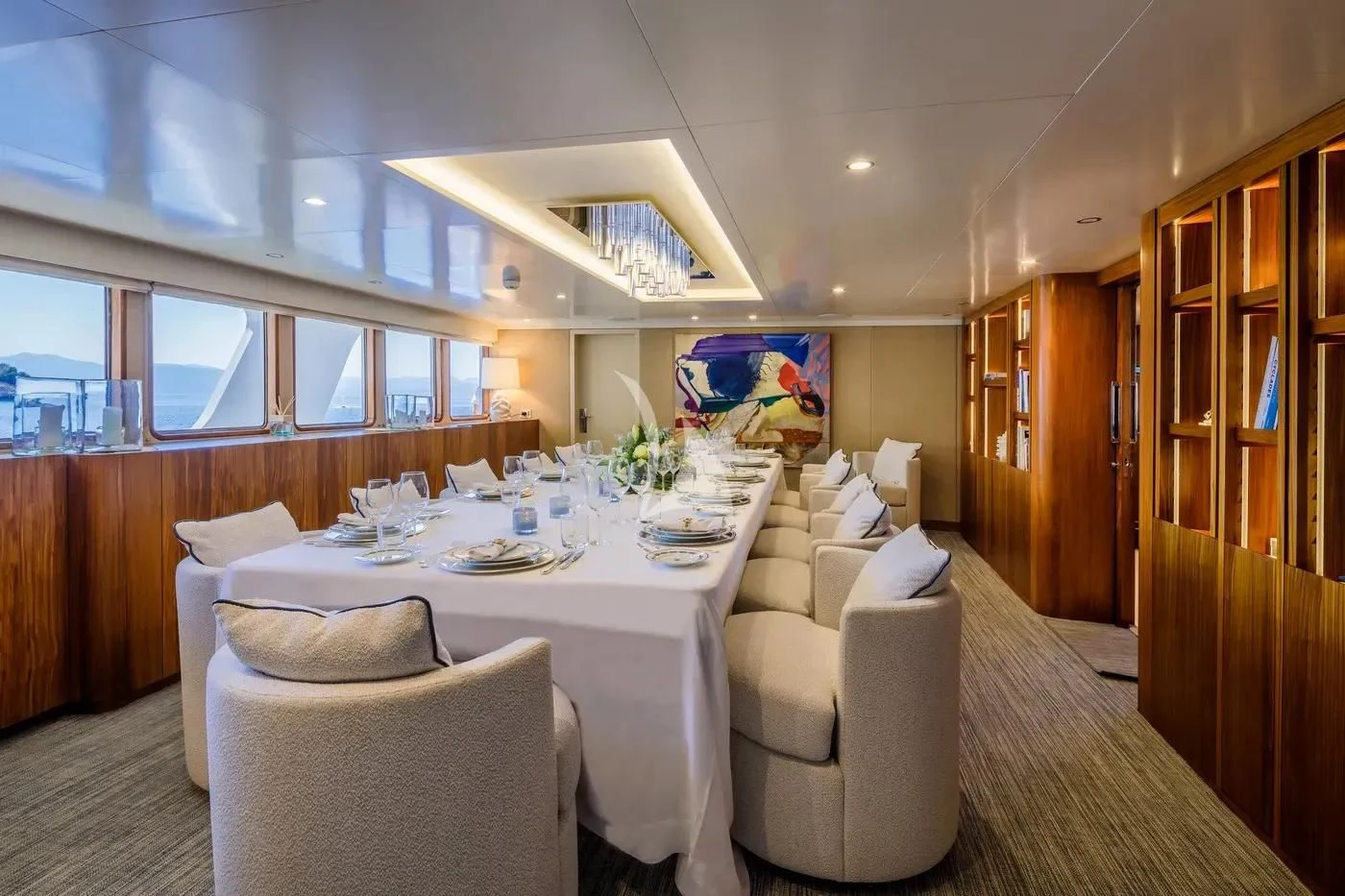 a dining room with a table aboard ITOTO Yacht for Charter