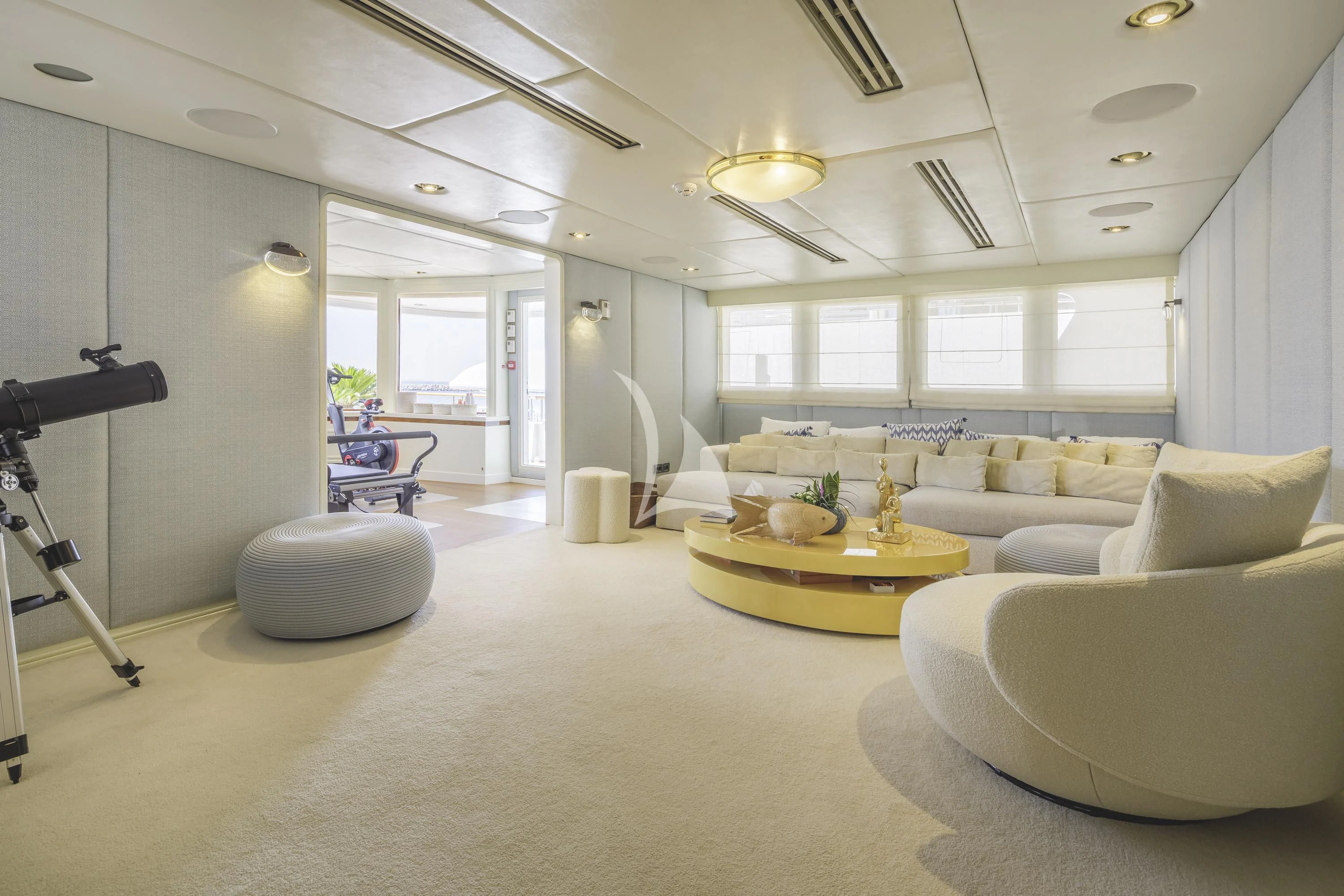 a living room with a large window aboard ITOTO Yacht for Charter