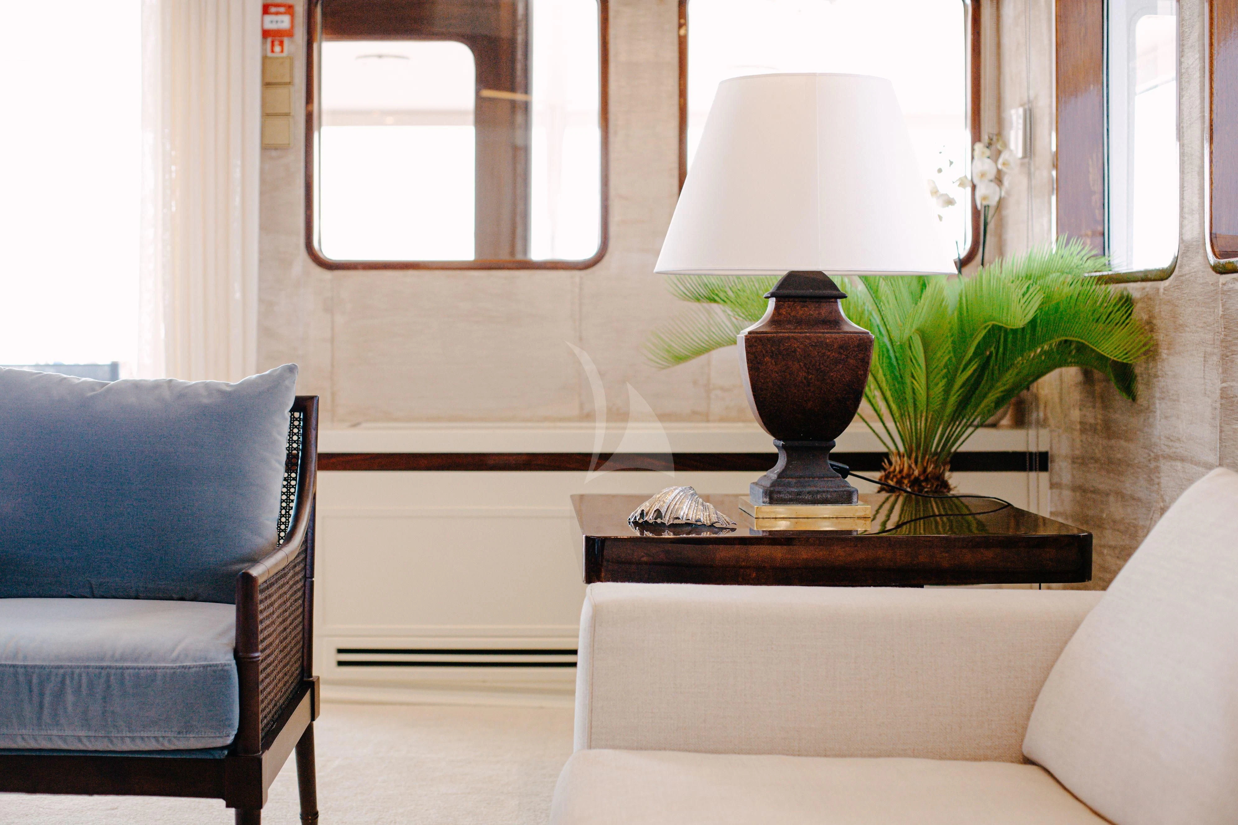 a lamp on a table aboard ITOTO Yacht for Charter