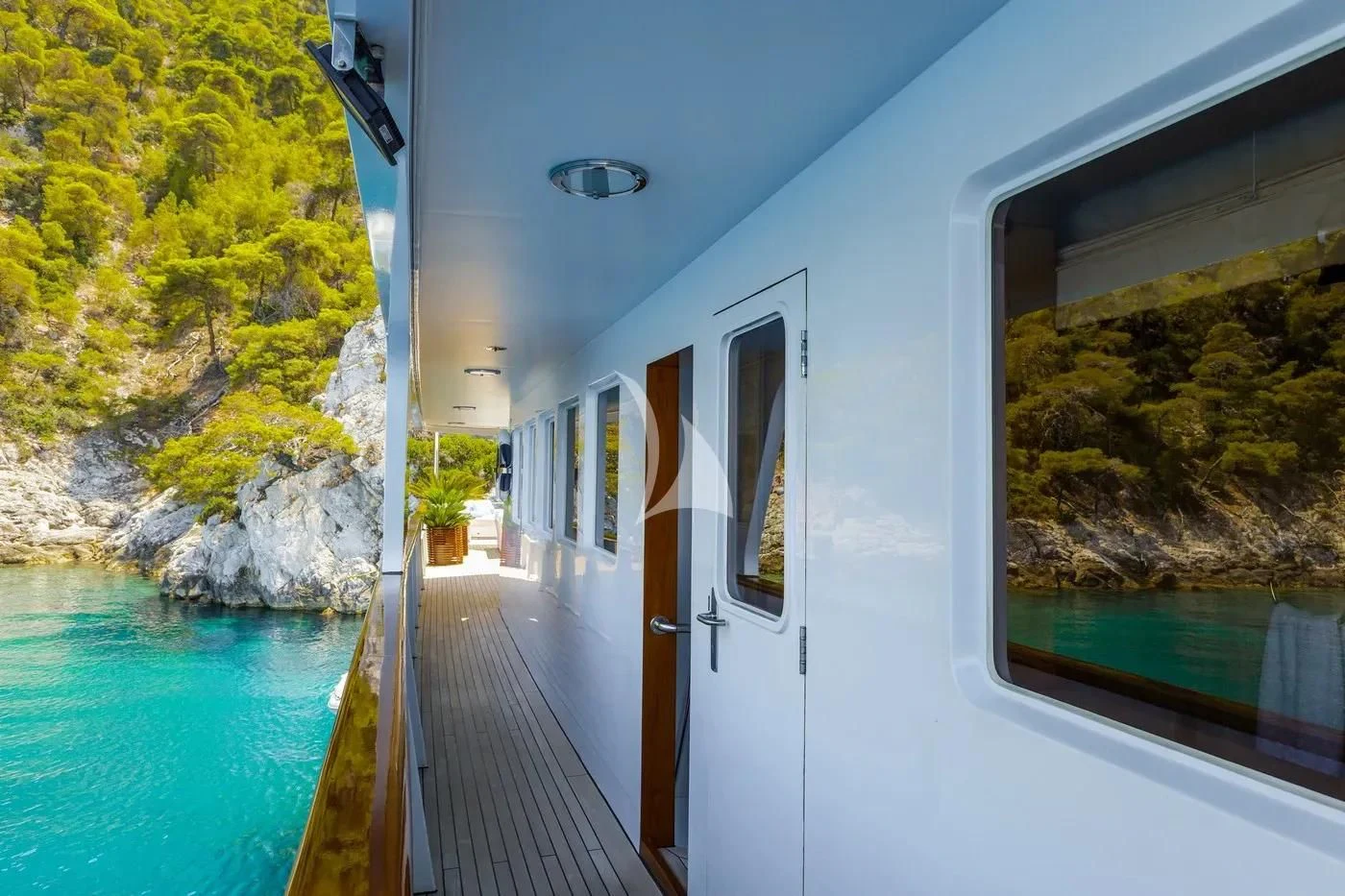 a balcony overlooking a pool aboard ITOTO Yacht for Charter