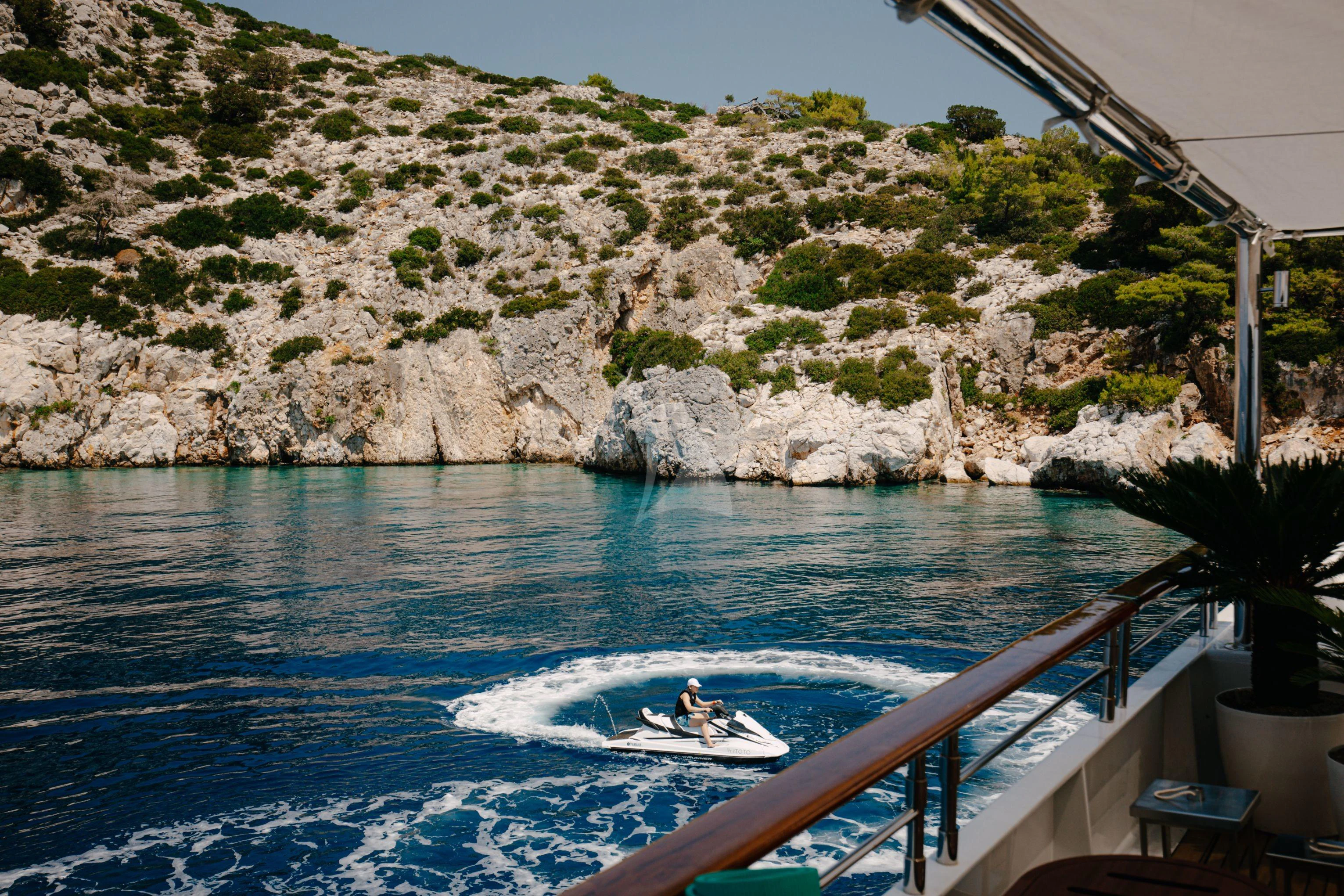 a person on a jet ski aboard ITOTO Yacht for Charter