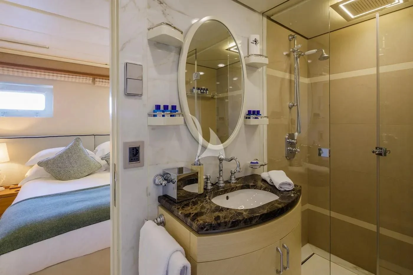 a bathroom with a sink and a mirror aboard ITOTO Yacht for Charter
