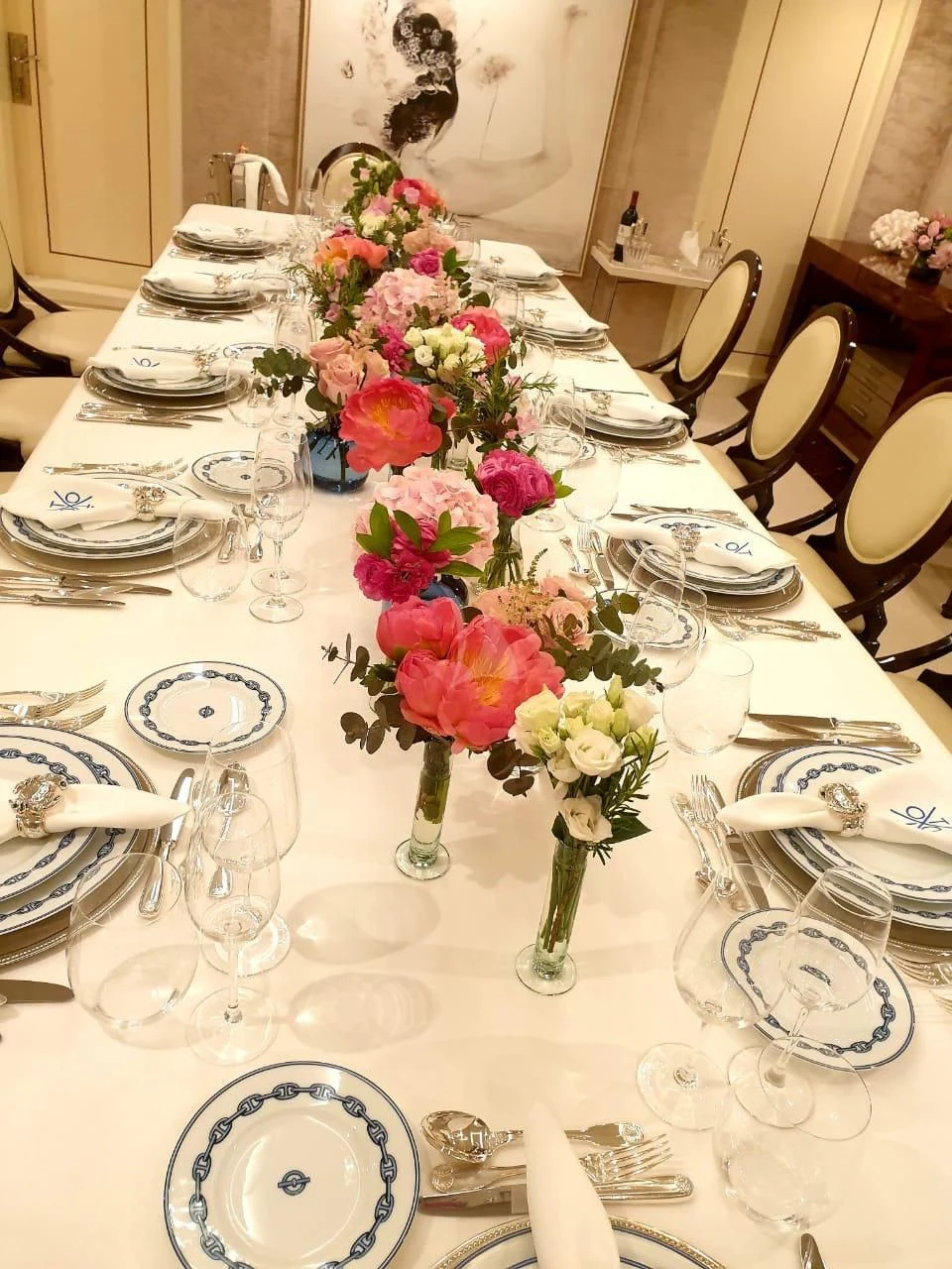a table set with place settings aboard ITOTO Yacht for Charter