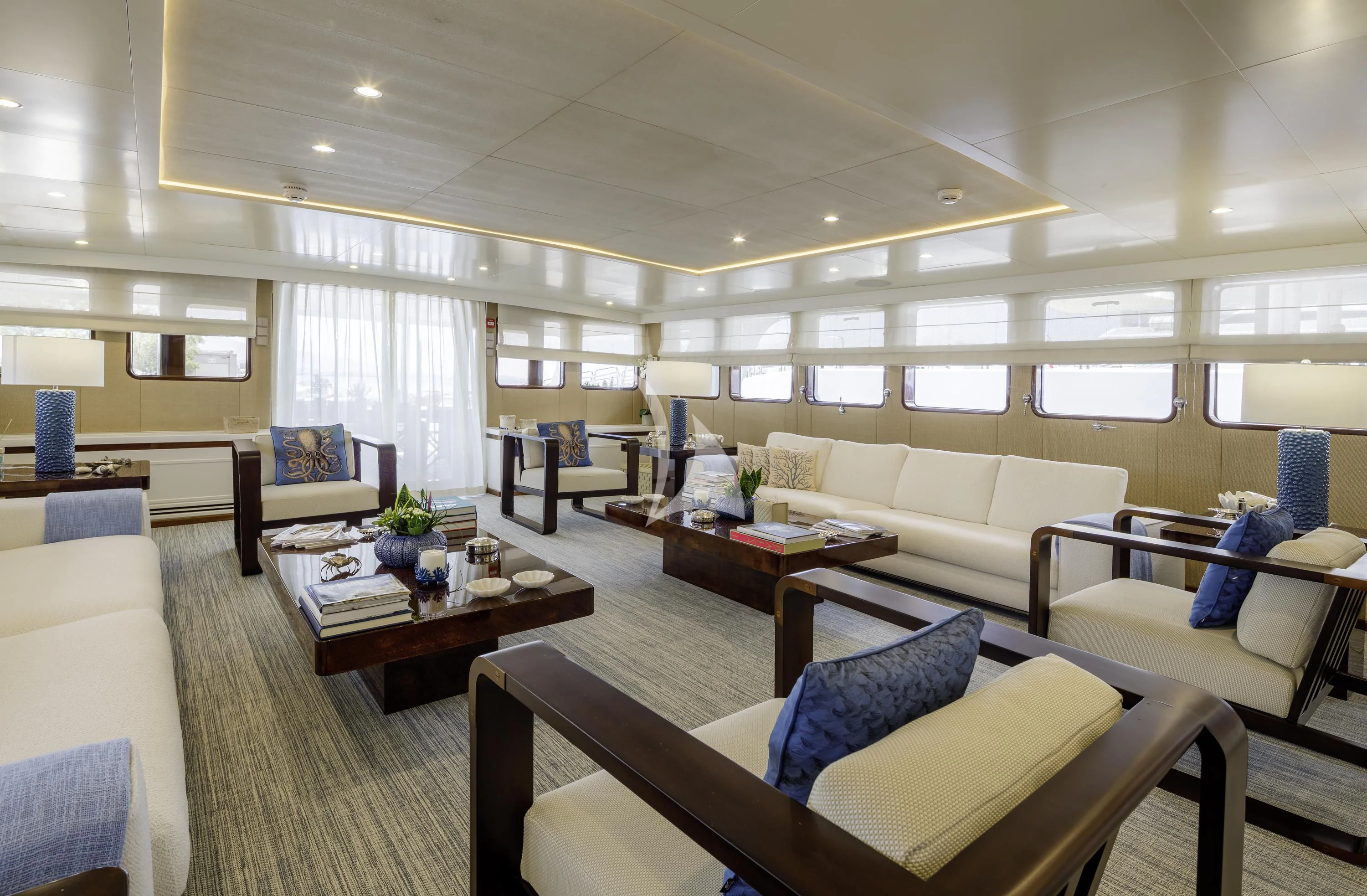 a living room with a couch and a coffee table aboard ITOTO Yacht for Charter