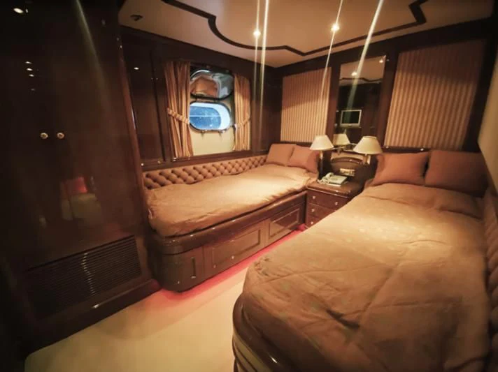 a couple of beds in a hotel room aboard GALLUS Yacht for Sale