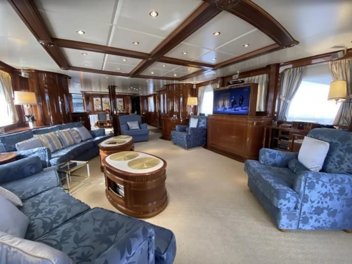 a living room with a wood ceiling aboard GALLUS Yacht for Sale