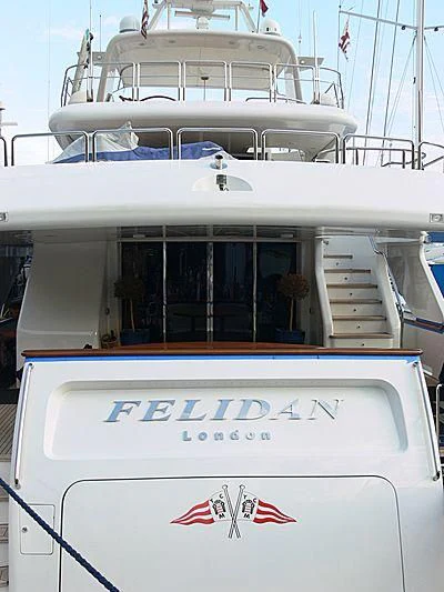 a boat with a flag on the front aboard GALLUS Yacht for Sale