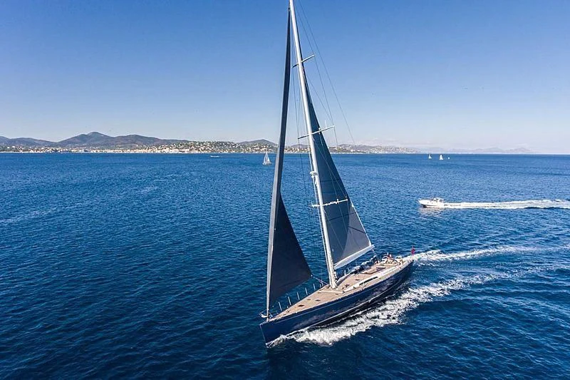 a sailboat on the water aboard INTO THE SUNSET Yacht for Sale