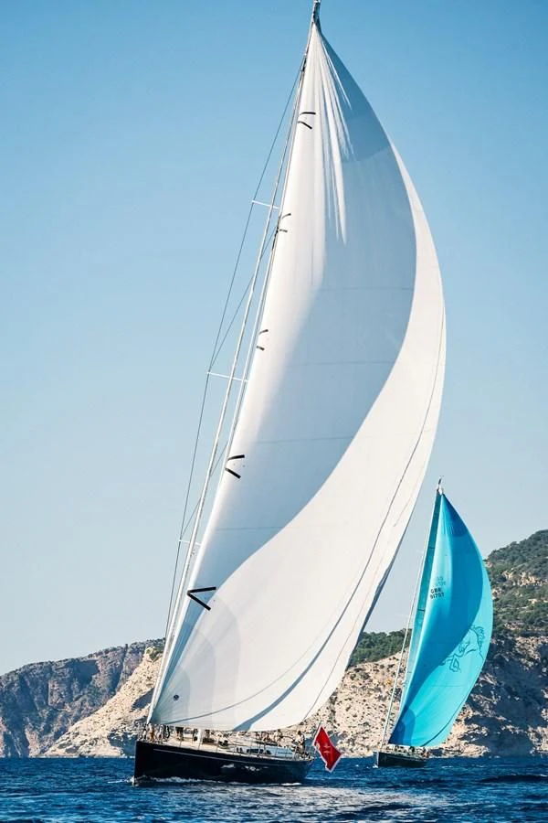 a couple of sailboats on the water aboard INTO THE SUNSET Yacht for Sale