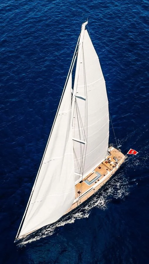 a sailboat in the water aboard INTO THE SUNSET Yacht for Sale
