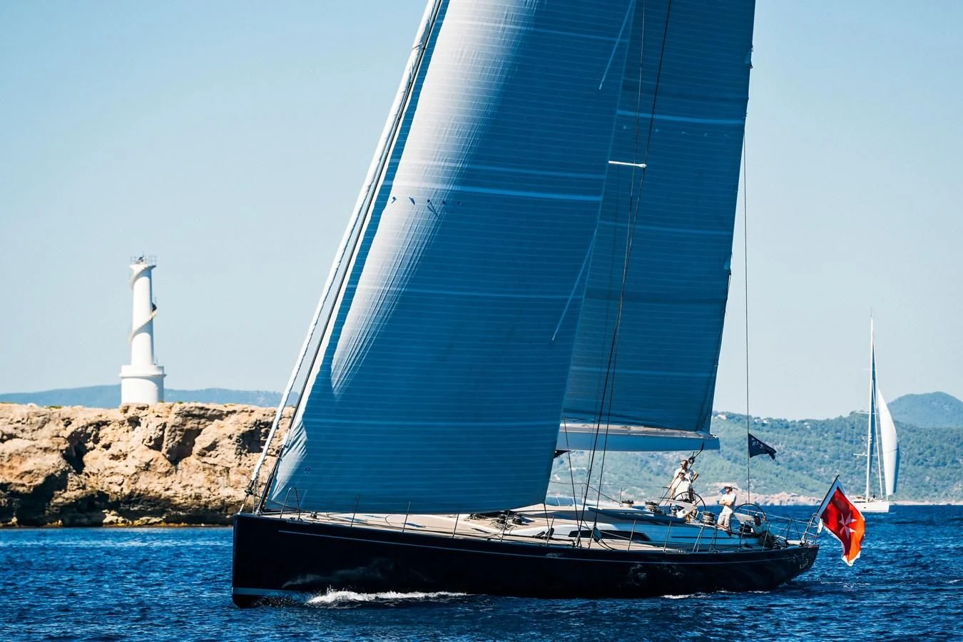 a sailboat on the water aboard INTO THE SUNSET Yacht for Sale