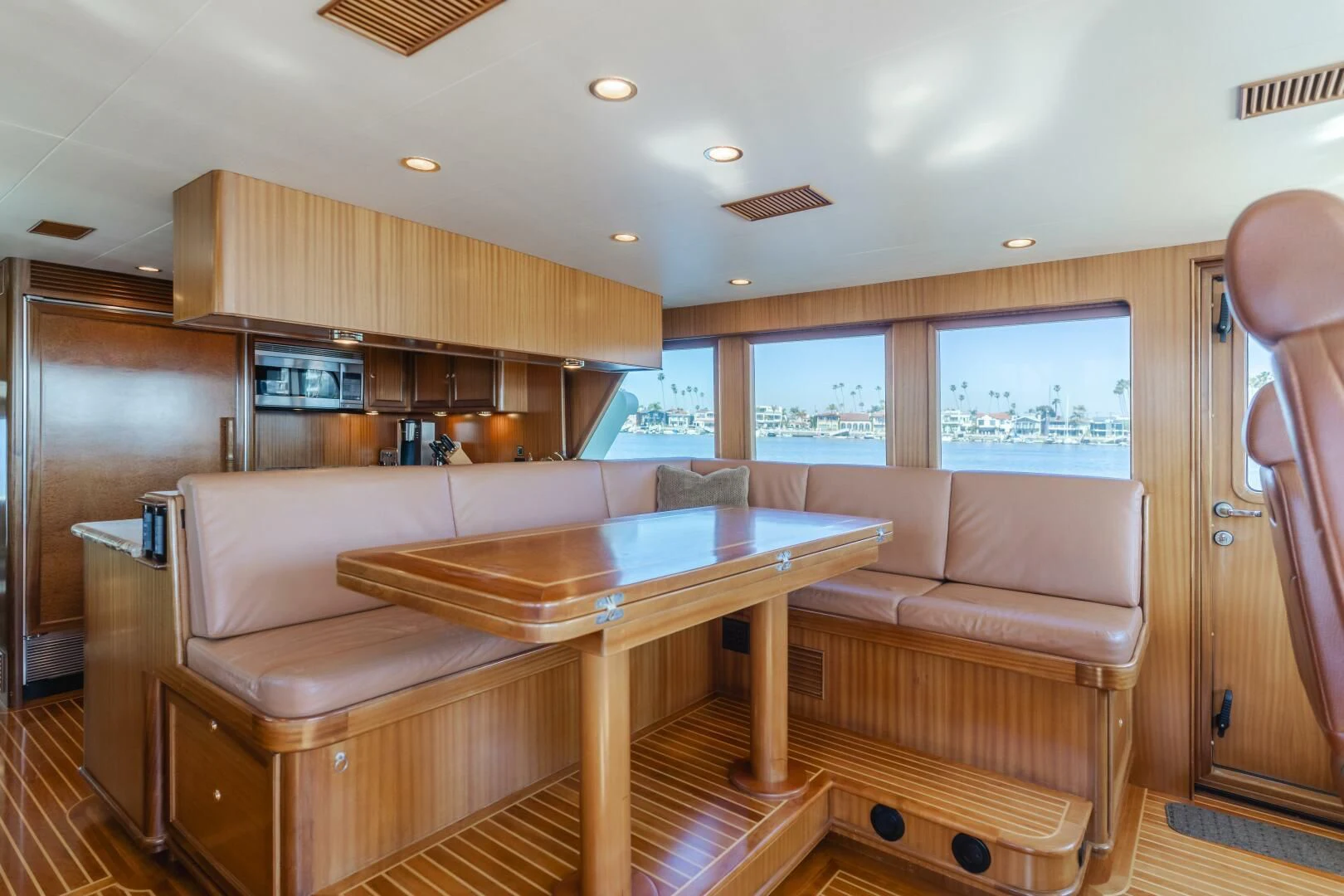 a living room with a couch and a table aboard AL DI LA Yacht for Sale
